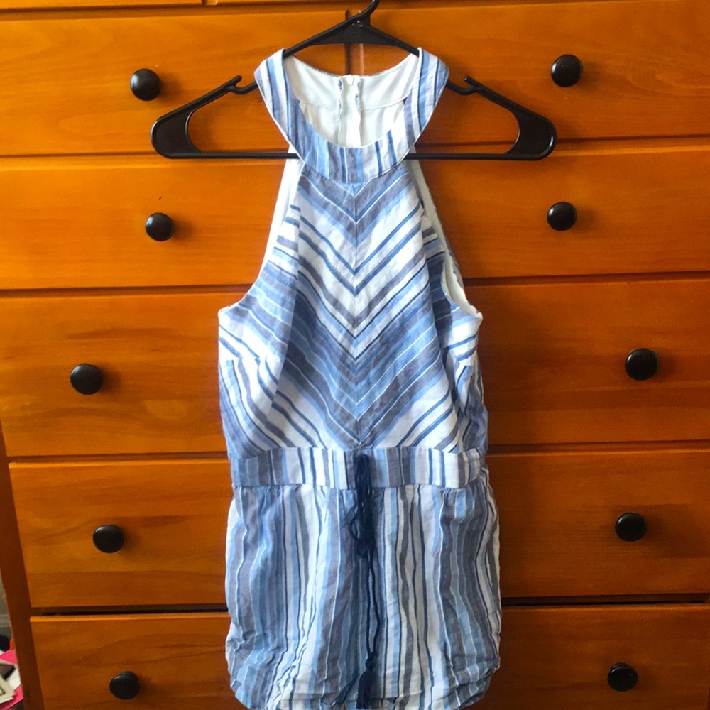 Medium Crystal Sky romper with tassels in front